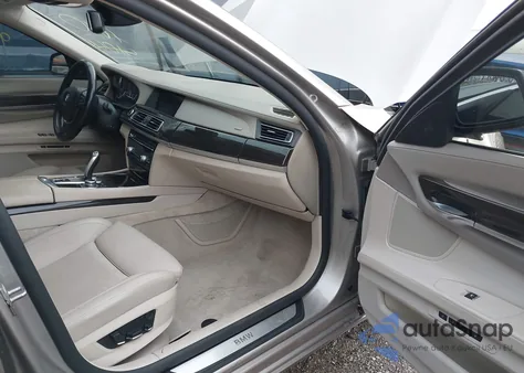 2012 BMW 750Li z USA, uszkodzony, nr VIN WBAKB8C50CC963246